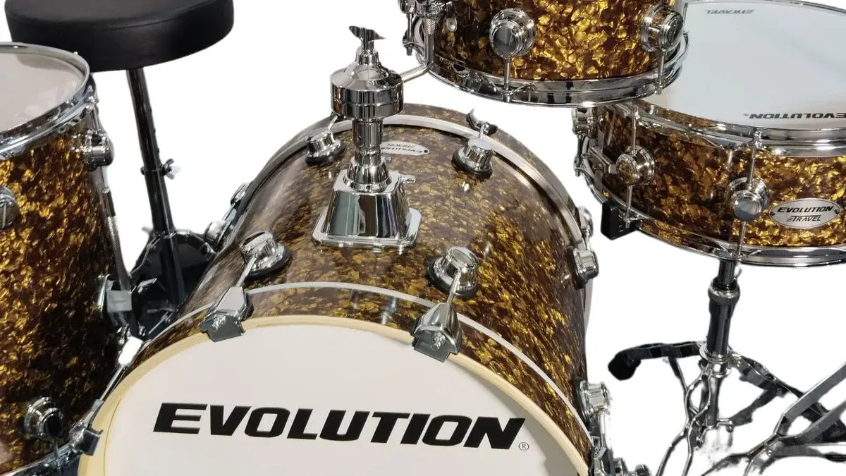 EVOLUTION | BATERÍA EVOLUTION TRAVEL FABRICADA EN MADERA DE ARCE COLOR MARRÓN PERLADO.
